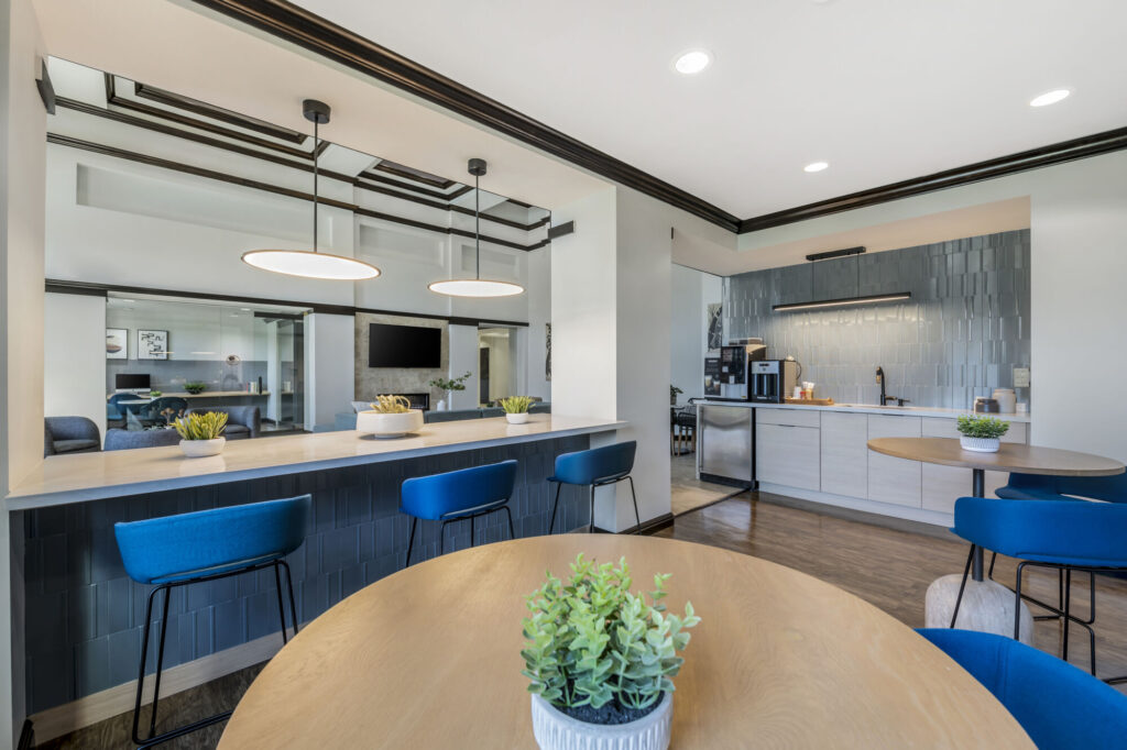 Clubhouse kitchen with coffee station and bar seating